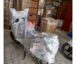 Rehousing packers and mover's bike transportation services image in Goa office