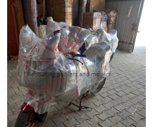 Rehousing packers and mover's bike transportation services image in Kochi office