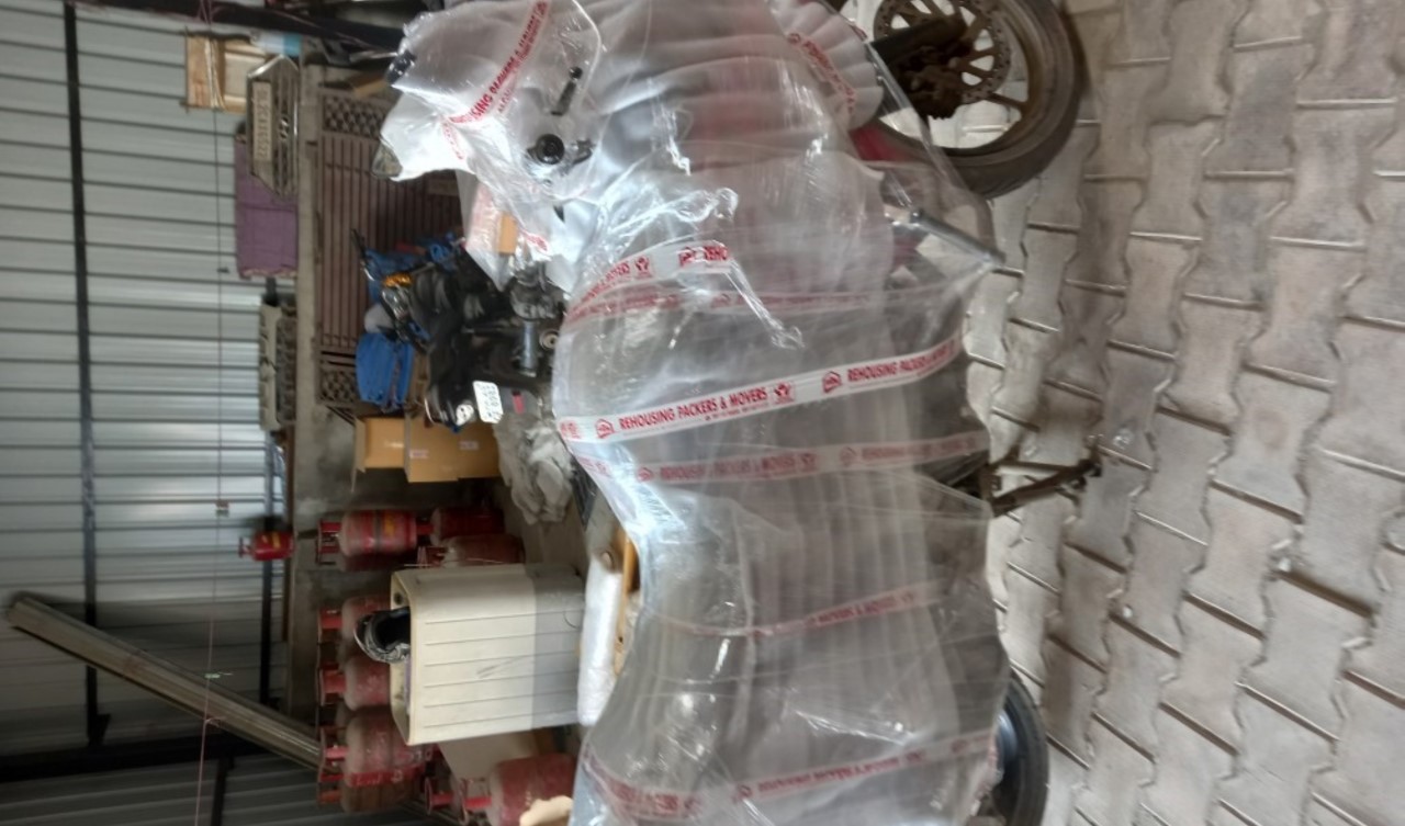 Rehousing packers and mover's bike transportation services image in Aligarh office