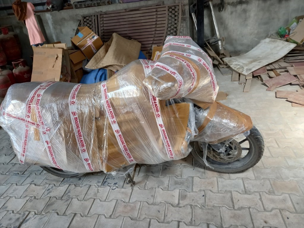 Rehousing packers and movers bike parcel services photo in Nashik images branch