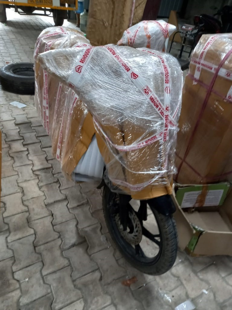 Rehousing packers and movers bike parcel services photo in Lucknow images branch